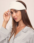 Model wears Inez Washable Silk Eye Mask in Ivory.