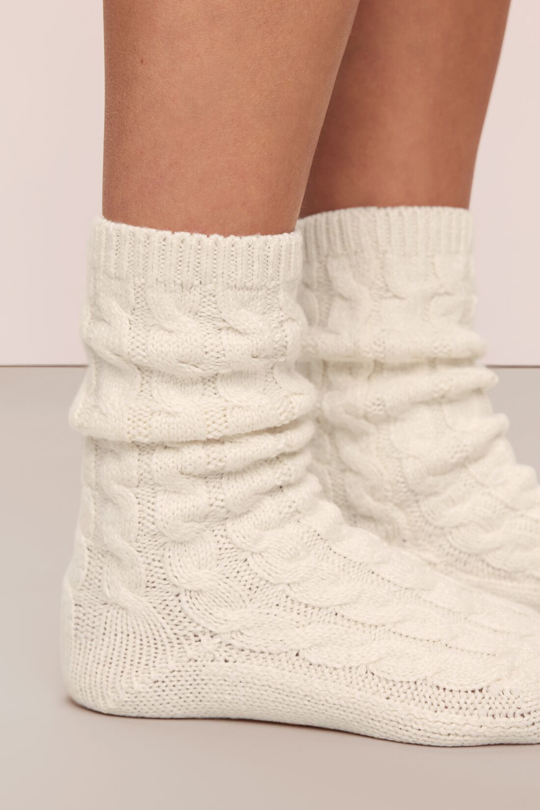 Model in Cozy Socks in Ivory.