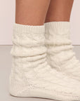 Model in Cozy Socks in Ivory.