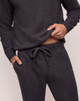 Model wears Men's Recycled Boucle Jogger in Graphite.