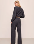 Model wears Recycled Boucle Relaxed Fit Pant in Graphite.