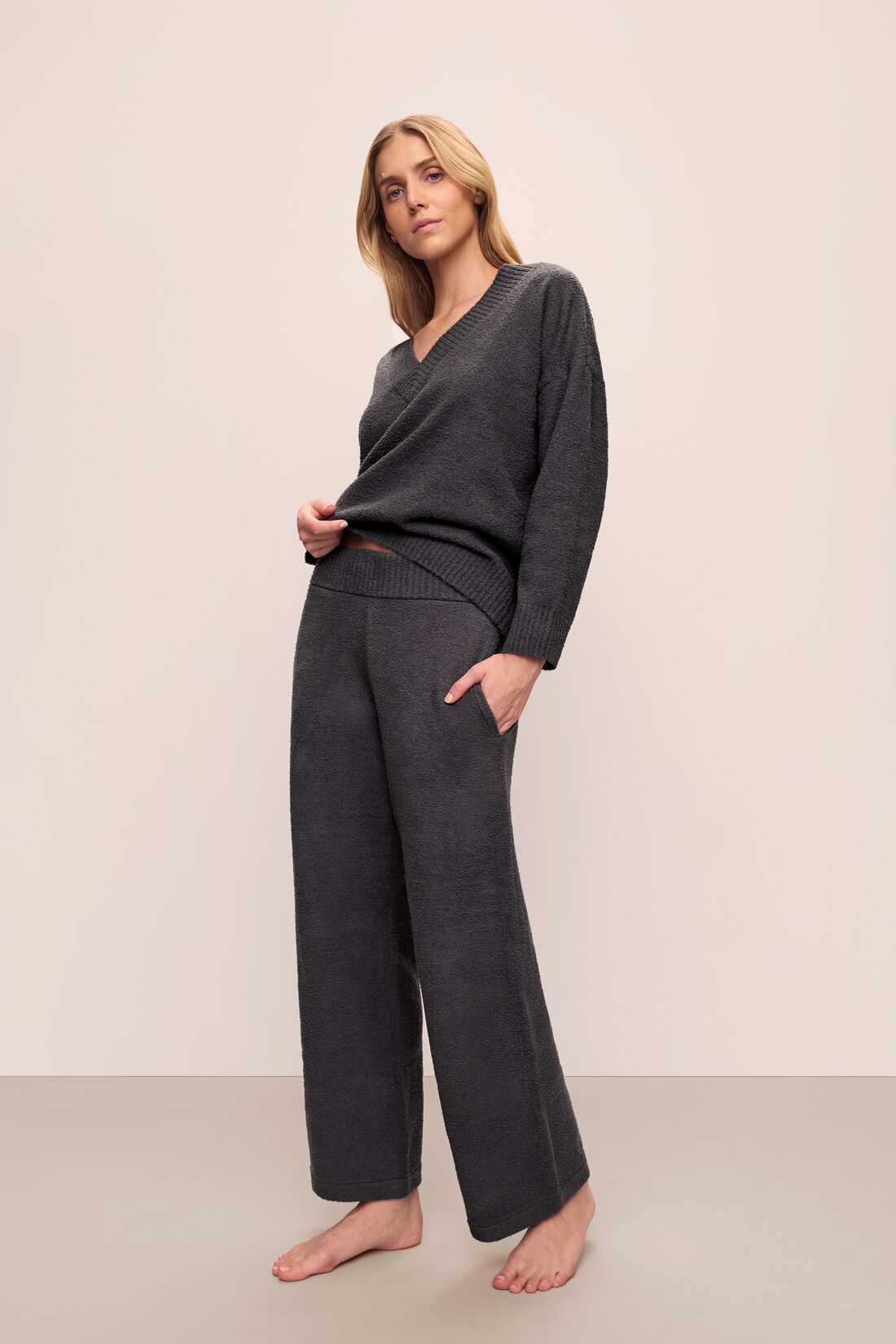 Model wears Recycled Boucle Relaxed Fit Pant in Graphite.