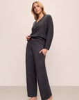 Model wears Recycled Boucle Relaxed Fit Pant in Graphite.