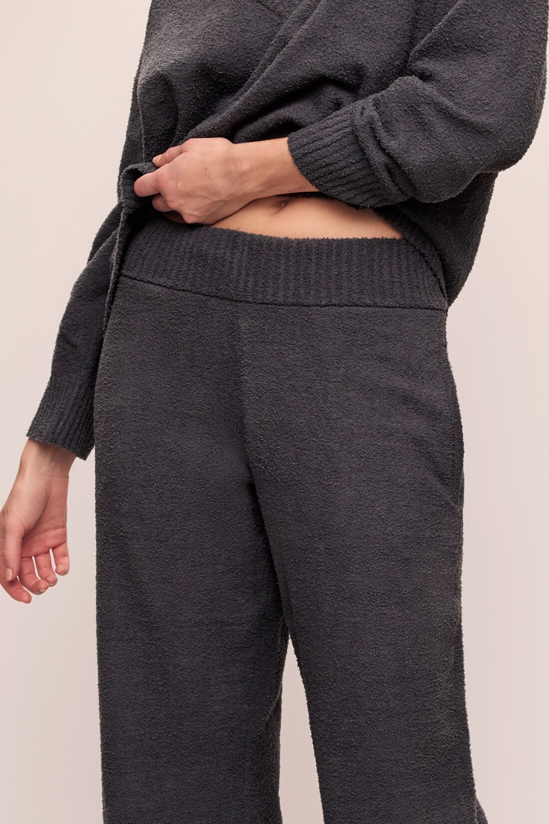 Model wears Recycled Boucle Relaxed Fit Pant in Graphite.