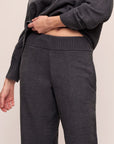 Model wears Recycled Boucle Relaxed Fit Pant in Graphite.