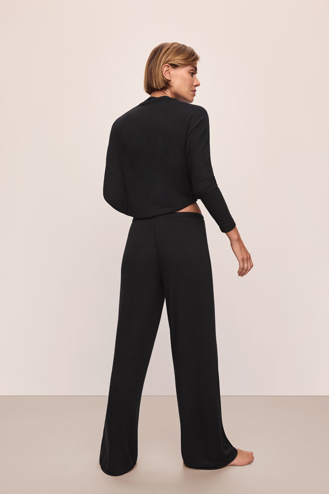 Model wears Cozy Time Wide Leg Pant in Black.