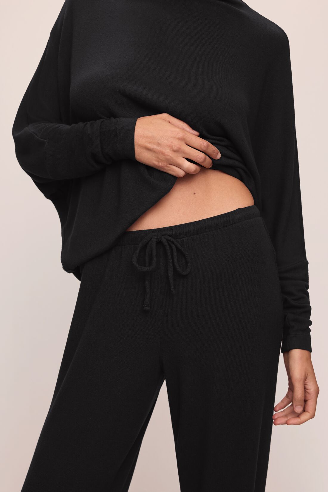 Model wears Cozy Time Wide Leg Pant in Black.