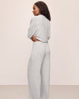 Model wears Cozy Time Wide Leg Pant in Lt. Heather Grey.