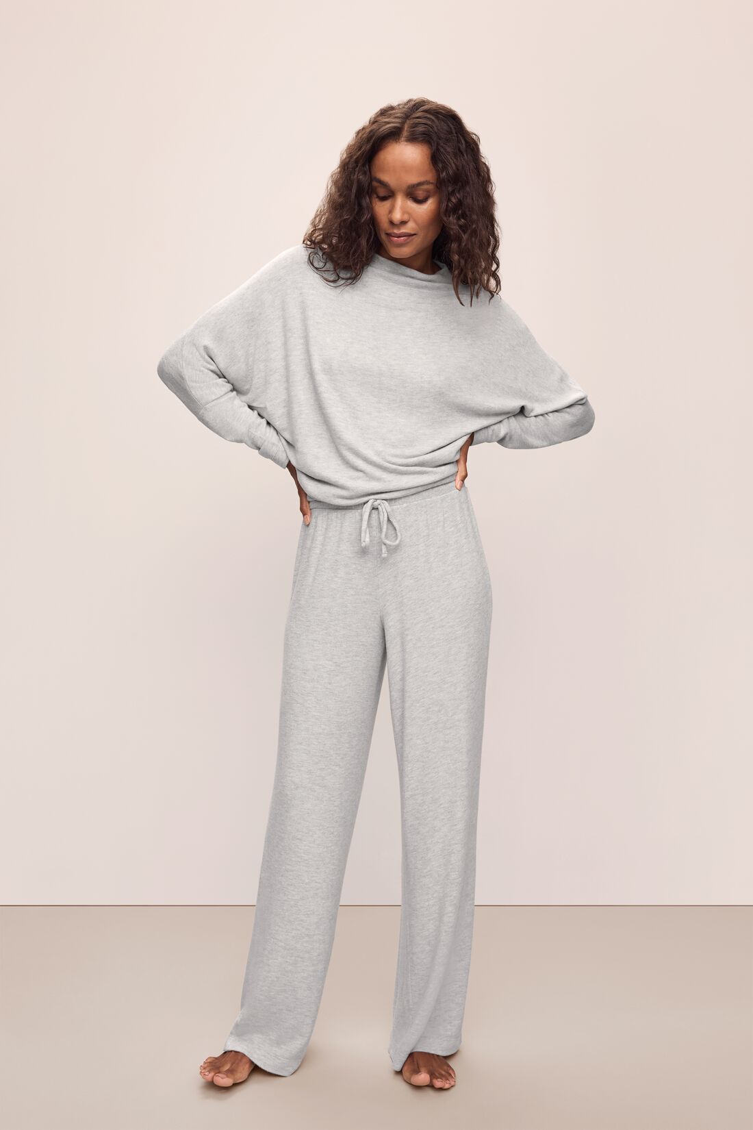 Model wears Cozy Time Wide Leg Pant in Lt. Heather Grey.