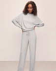 Model wears Cozy Time Wide Leg Pant in Lt. Heather Grey.