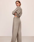 Model wears Reversible Plush High Waist Pant in Toffee.