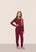 Model is wearing Kids TENCEL™ Modal Unisex Long PJ Set  in Bordeaux/Ivory