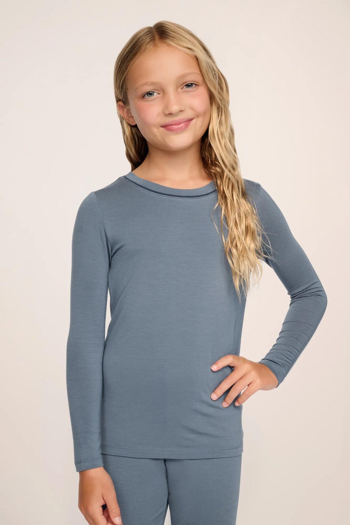 Model is wearing Kids TENCEL™ Modal Unisex Long PJ Set in Moonlight Blue/Navy