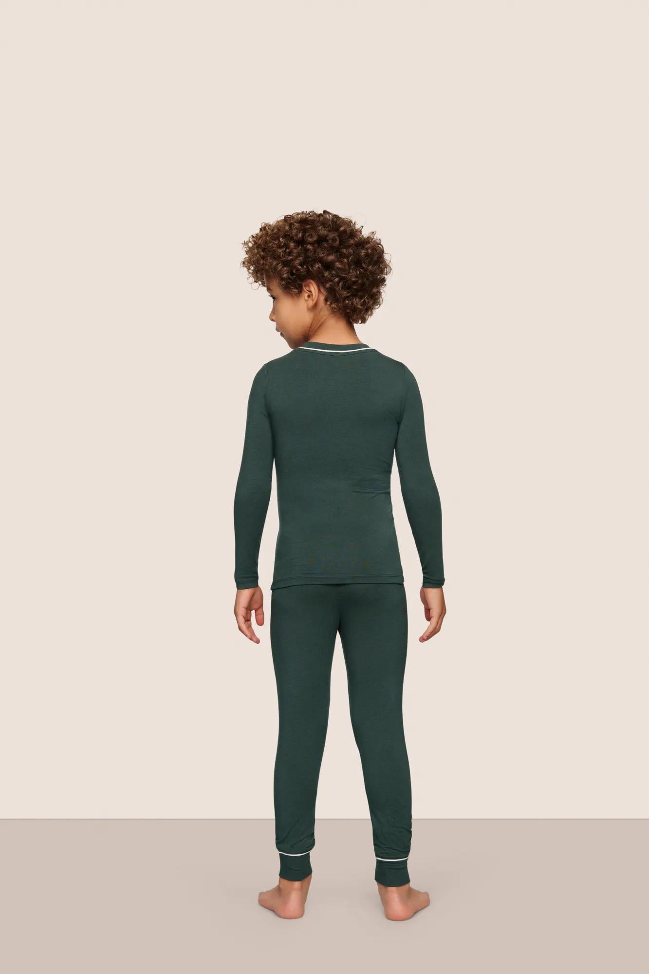 Model is wearing Kids TENCEL™ Modal Unisex Long PJ Set  in Pine/Ivory