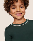 Model is wearing Kids TENCEL™ Modal Unisex Long PJ Set  in Pine/Ivory