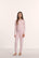 Model is wearing Kids TENCEL™ Modal Unisex Long PJ Set in Pale Pink/Fig