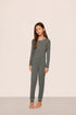 Model is wearing Kids TENCEL™ Modal Unisex Long PJ Set  in Smokey Olive/Ivory