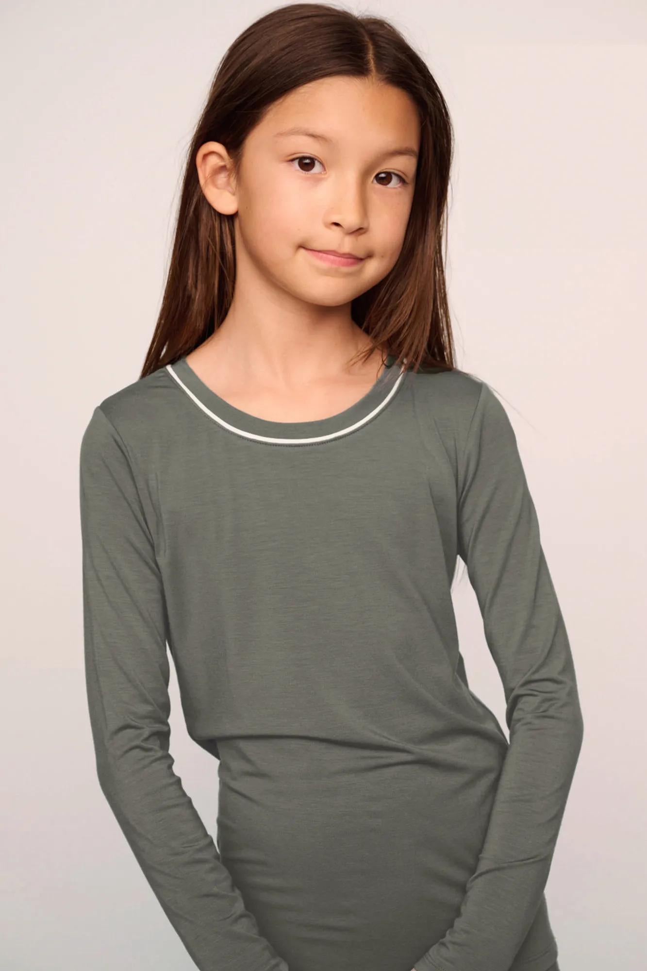 Model is wearing Kids TENCEL™ Modal Unisex Long PJ Set  in Smokey Olive/Ivory