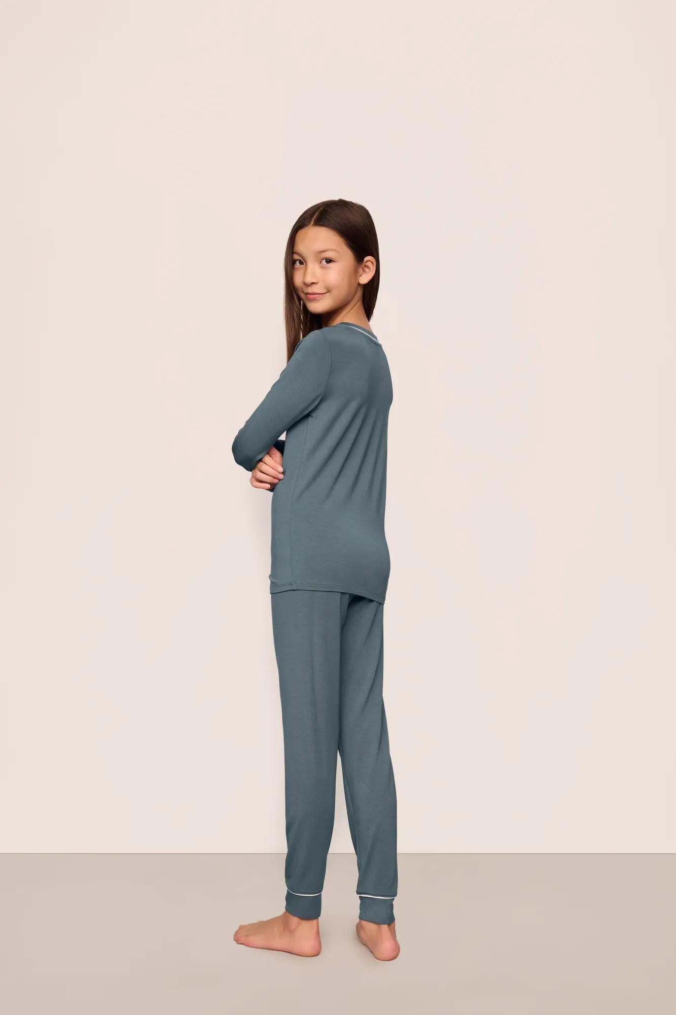 Model is wearing Kids TENCEL™ Modal Unisex Long PJ Set  in  Stone Blue/Ivory