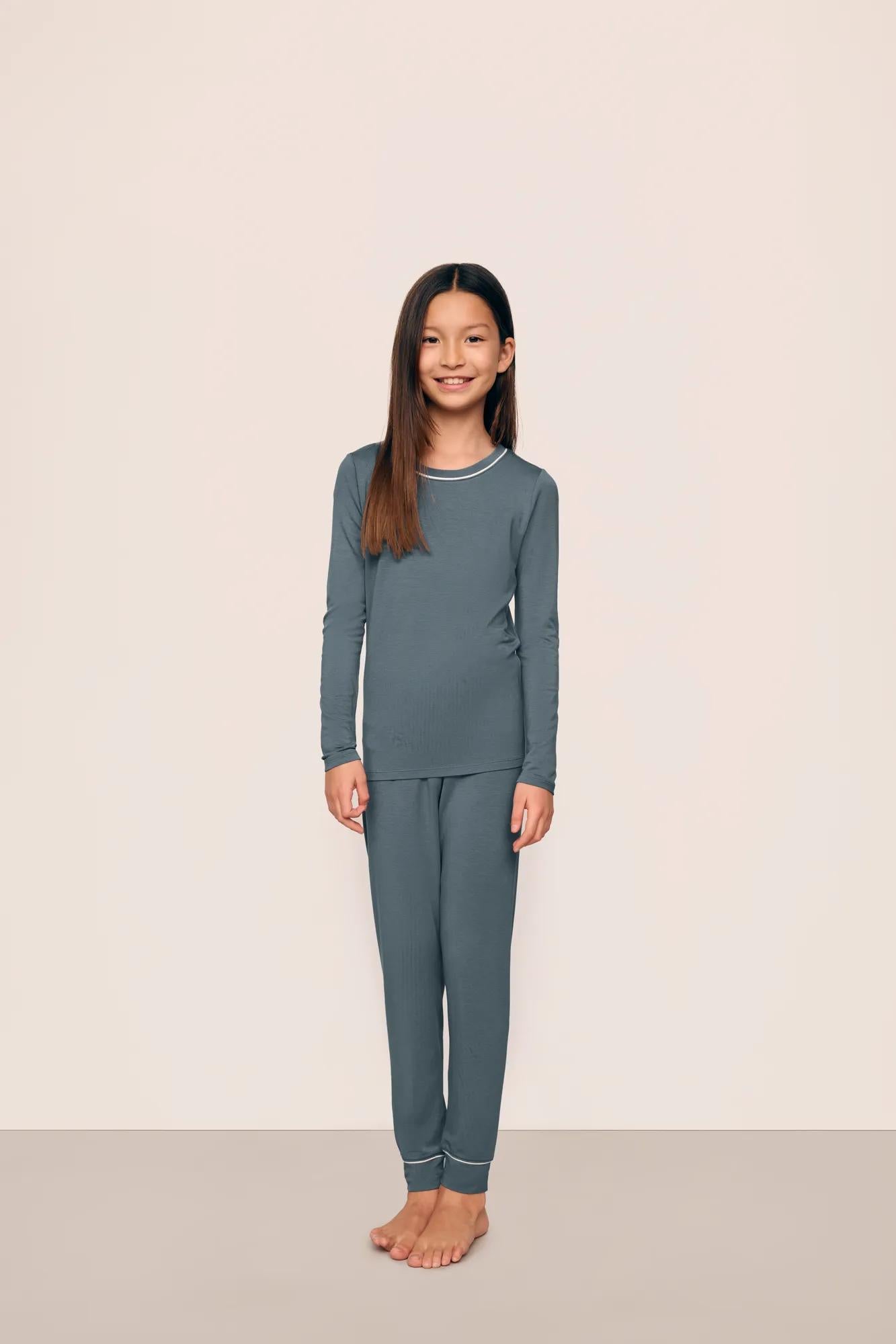 Model is wearing Kids TENCEL™ Modal Unisex Long PJ Set  in  Stone Blue/Ivory