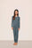 Model is wearing Kids TENCEL™ Modal Unisex Long PJ Set  in  Stone Blue/Ivory
