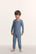 Model is wearing Kids Printed TENCEL™ Modal Unisex Long PJ Set in Duo Stripe Slate Blue/Ivory