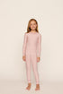 Model is wearing Kids Printed TENCEL™ Modal Unisex Long PJ Set in Duo Stripe Hollyred/Hollyred