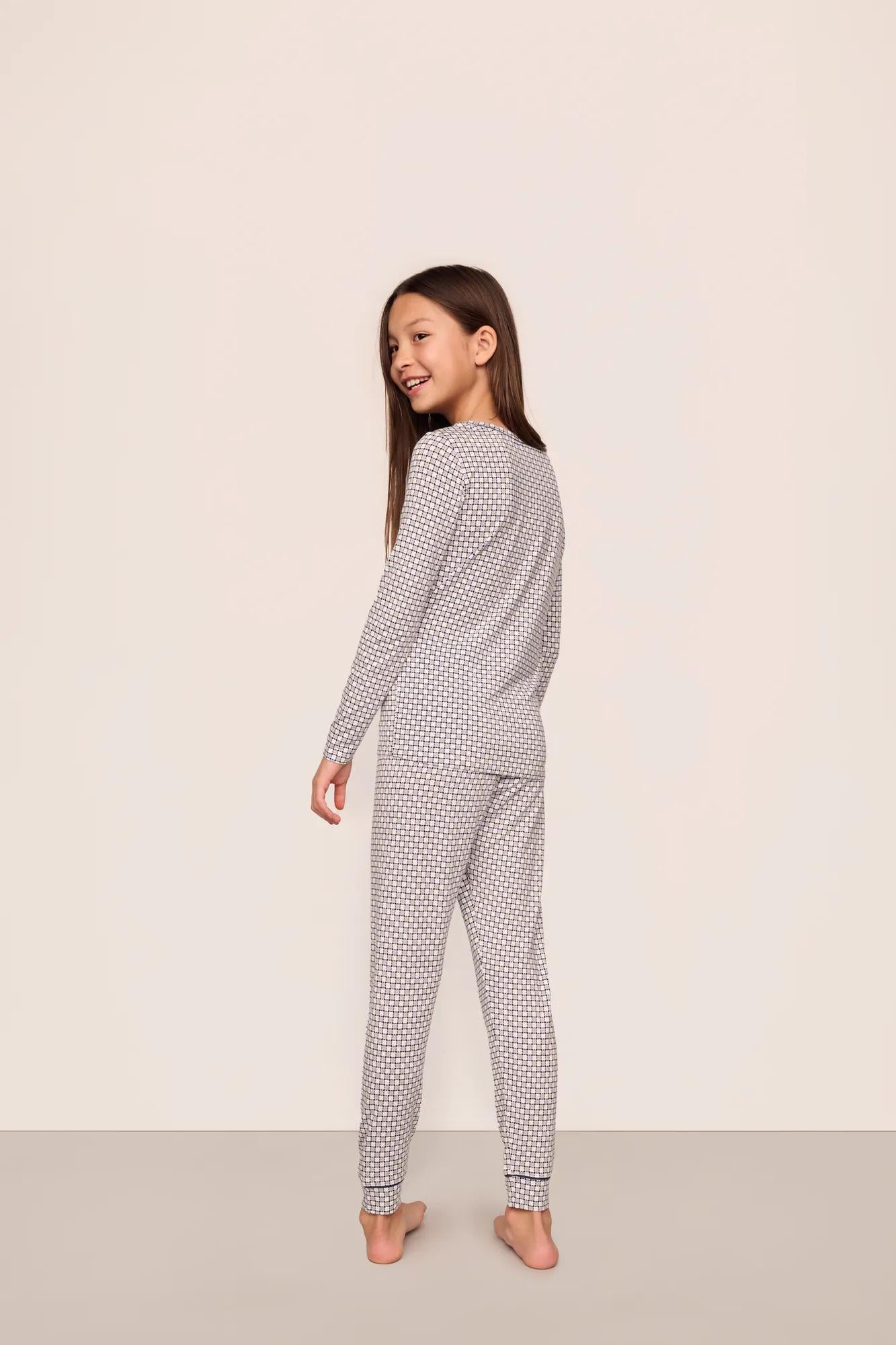 Model is wearing Kids Printed TENCEL™ Modal Unisex Long PJ Set  in  Geo