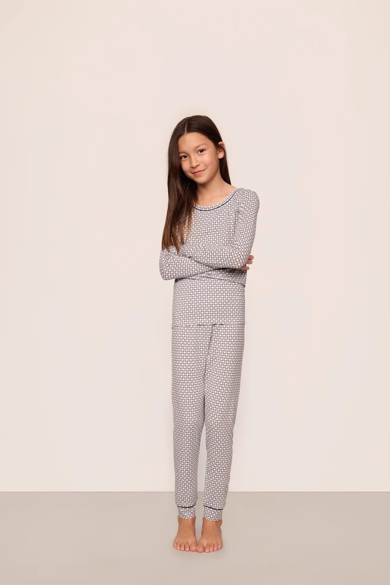 Model is wearing Kids Printed TENCEL™ Modal Unisex Long PJ Set  in  Geo