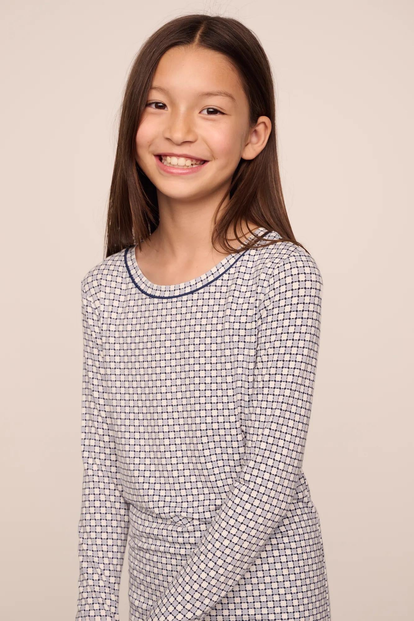 Model is wearing Kids Printed TENCEL™ Modal Unisex Long PJ Set  in  Geo