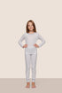 Model is wearing Kids Printed TENCEL™ Modal Unisex Long PJ Set  in Hannukah Glow Nouvean Navy/Ny
