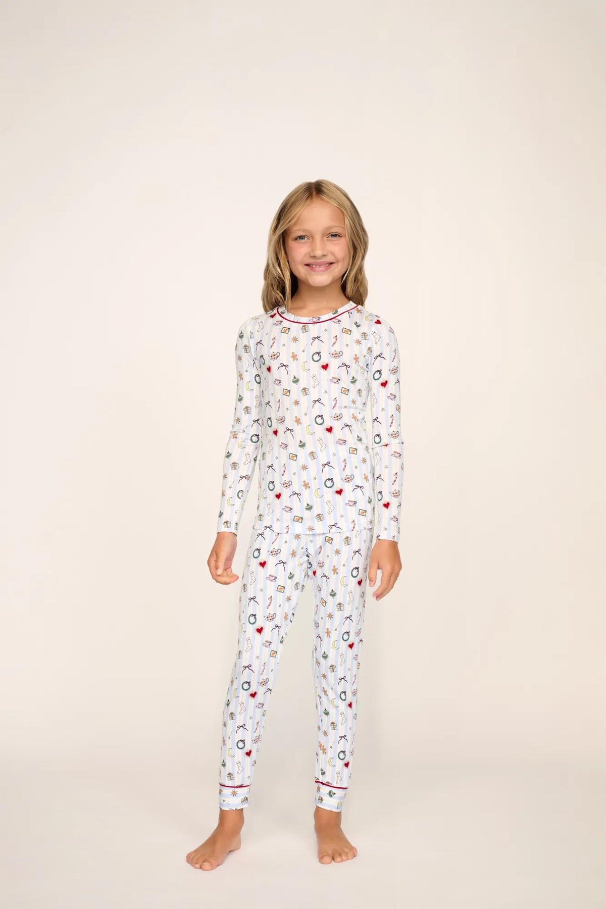 Model is wearing Kids Printed TENCEL™ Modal Unisex Long PJ Set in Nordic Nights Lightblue/Deepcl