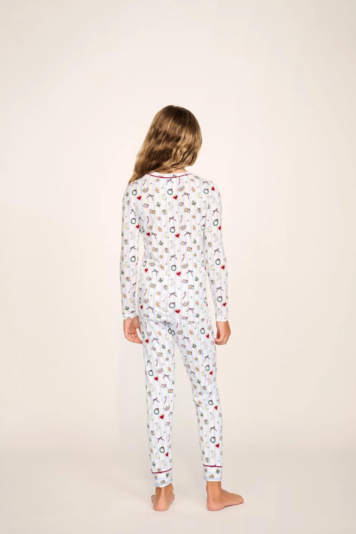 Model is wearing Kids Printed TENCEL™ Modal Unisex Long PJ Set in Nordic Nights Lightblue/Deepcl