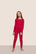 Model is wearing Kids Printed TENCEL™ Modal Unisex Long PJ Set  in Nutcracker Holly Red/Ivory