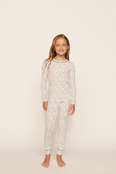 Model is wearing Kids Printed TENCEL™ Modal Unisex Long PJ Set in On The Slopes Ivory/Navy