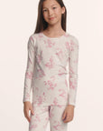 Model is wearing Kids Printed TENCEL™ Modal Unisex Long PJ Set in Rose Garden Cameo Pink/Pale Pi