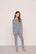 Model is wearing Kids Printed TENCEL™ Modal Unisex Long PJ Set  in Seashell Navy/Navy