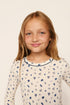 Model is wearing Kids Printed TENCEL™ Modal Unisex Long PJ Set in Twinkling Menorah Ivory/Navy