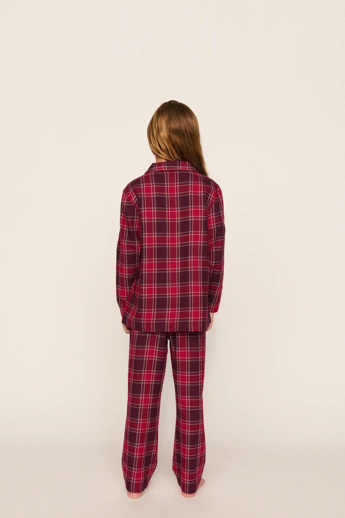 Model is wearing Kid's Flannel Long PJ Set in Oxford Check Holly Red/Wildber