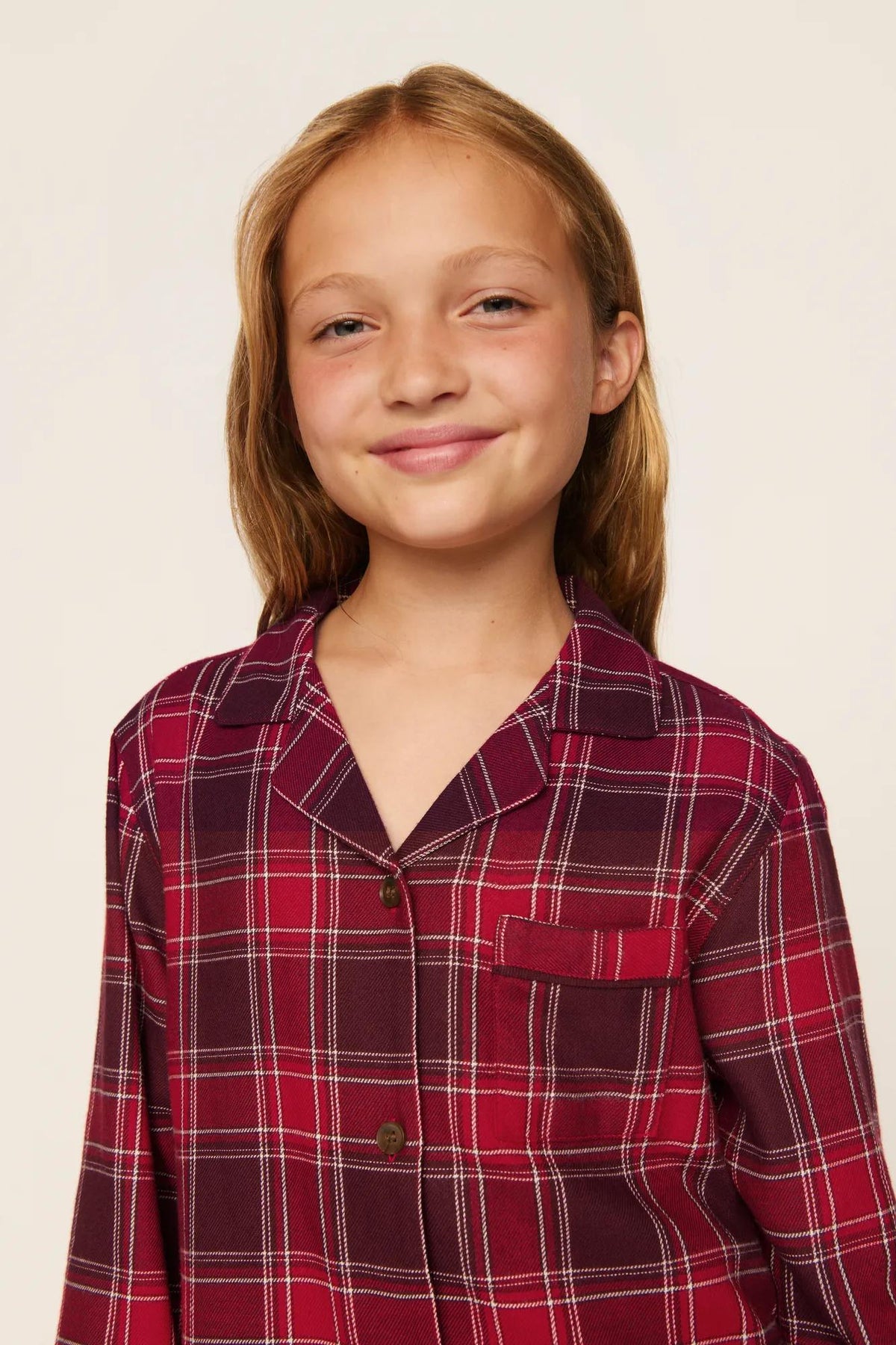 Model is wearing Kid's Flannel Long PJ Set in Oxford Check Holly Red/Wildber