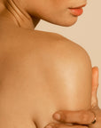 Image of model using True Botanicals body butter