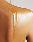 Image of model wearing True Botanical Body Oil