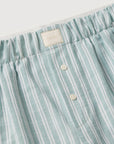 Model is wearing Nautico Boxer Pant in Regatta Stripe Seagrass/White