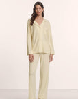 Model is wearing Gisele TENCEL™ Modal Long PJ Set in Buttercream/Ivory