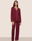 Model is wearing Gisele TENCEL™ Modal Long PJ Set  in Bordeaux/Ivory