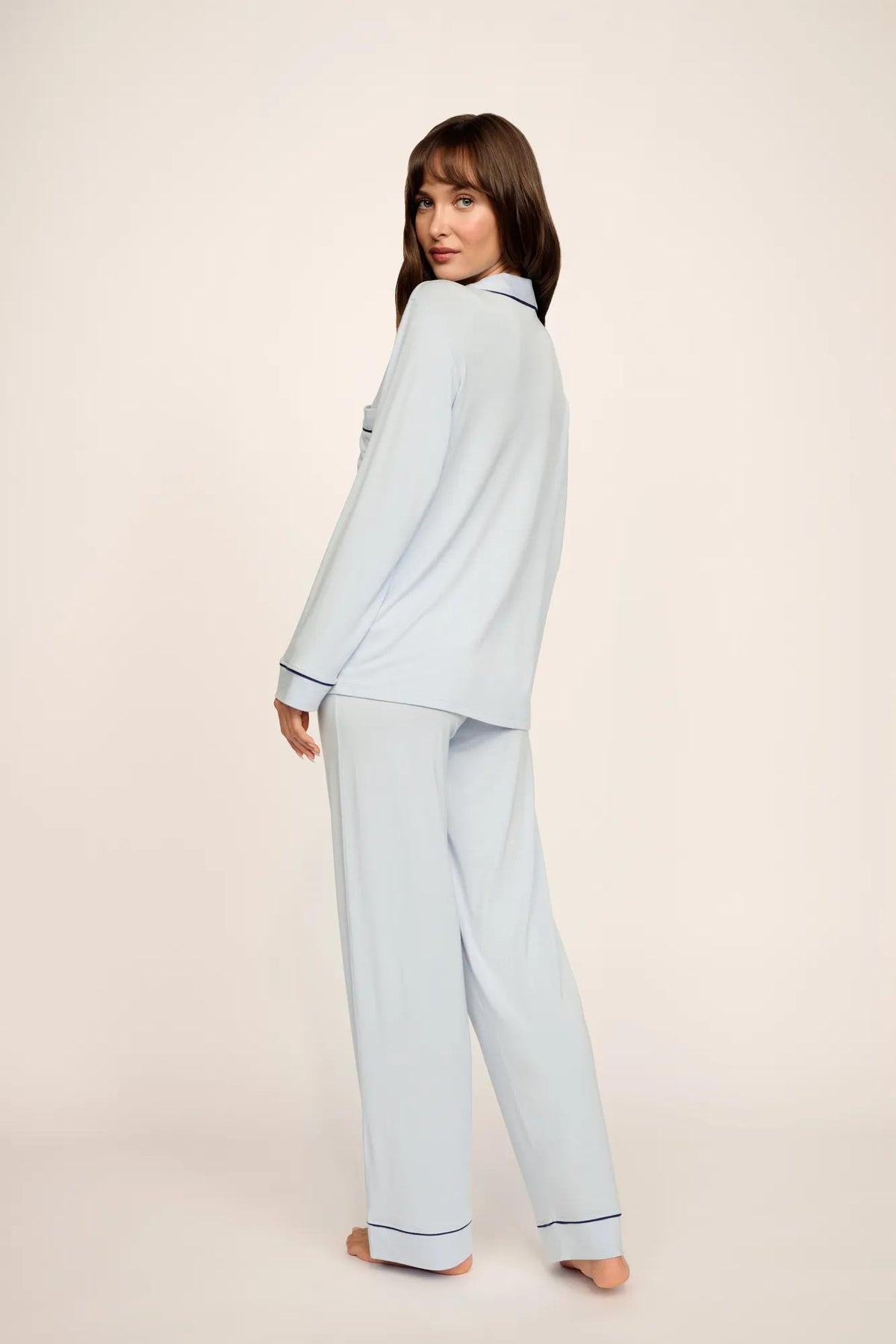 Model is wearing Gisele TENCEL™ Modal Long PJ Set in Cloud Blue/Navy