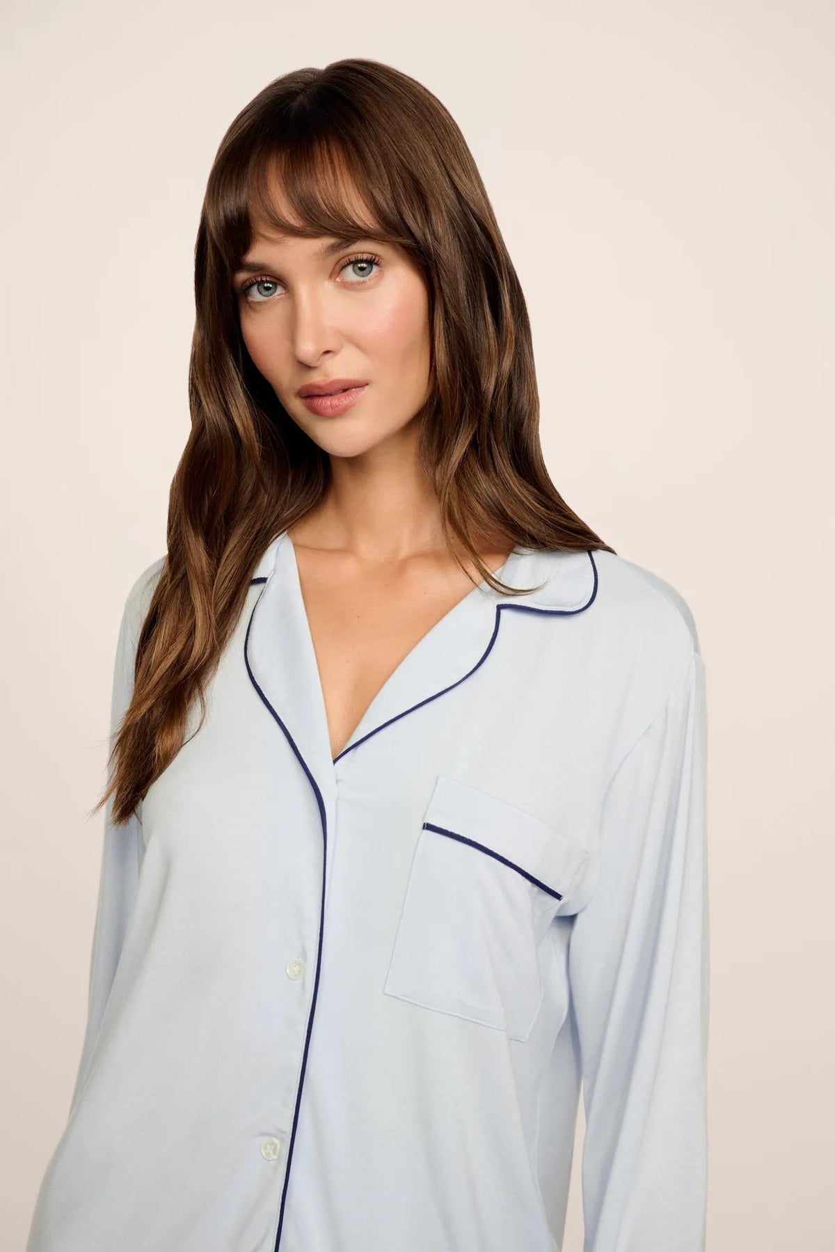 Model is wearing Gisele TENCEL™ Modal Long PJ Set in Cloud Blue/Navy