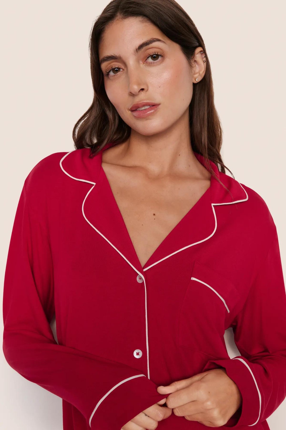 Model is wearing Gisele TENCEL™ Modal Long PJ Set in Holly Red/Ivory