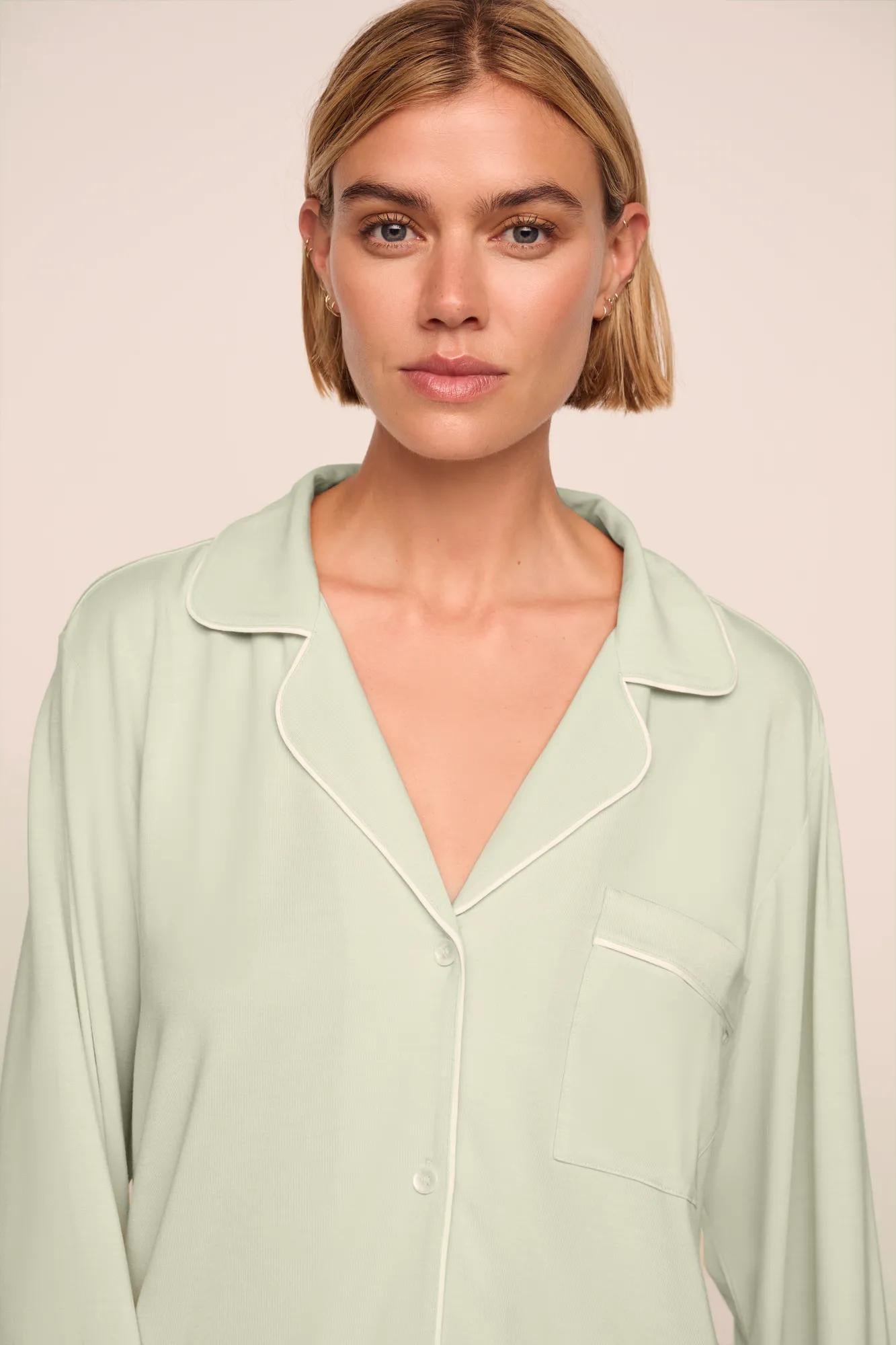 Model is wearing Gisele TENCEL™ Modal Long PJ Set  in Mint Cream/Ivory