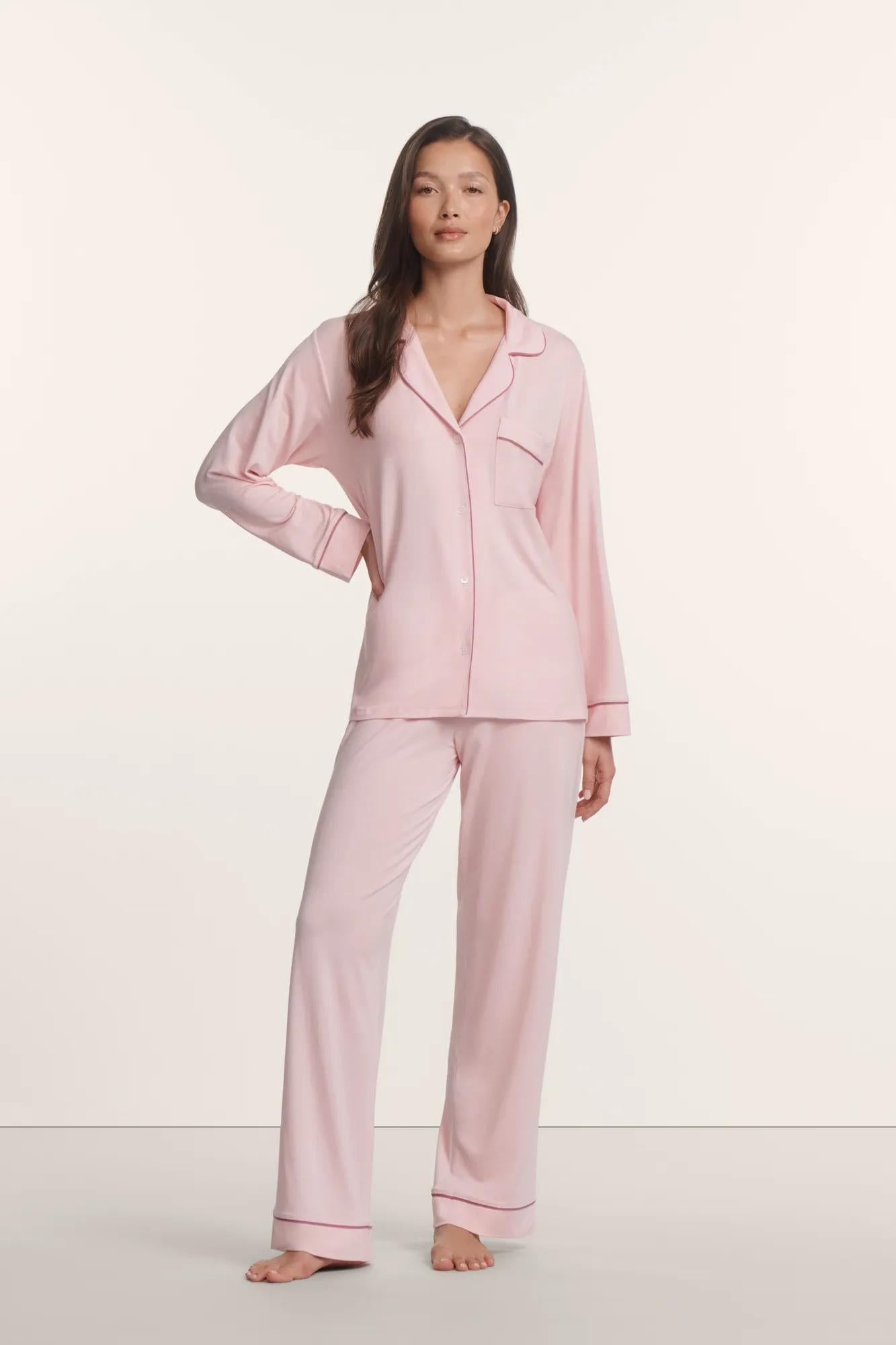 Model is wearing Gisele TENCEL™ Modal Long PJ Set in Pale Pink/Fig